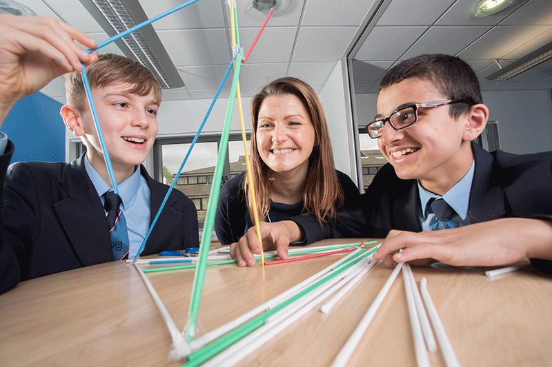 Pupils working on a science experiment